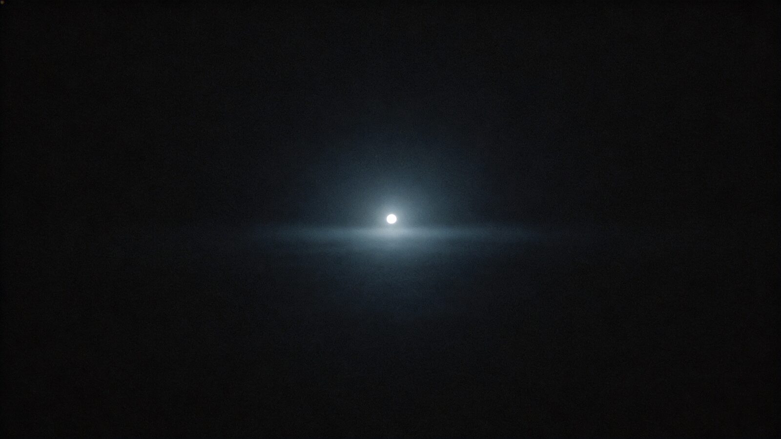 Illustration: a single bright point of light in wholly featureless darkness, without horizon or reference — size and distance cannot be judged.
